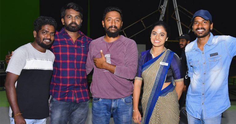 Young team gearing up for a movie called Assistant Director