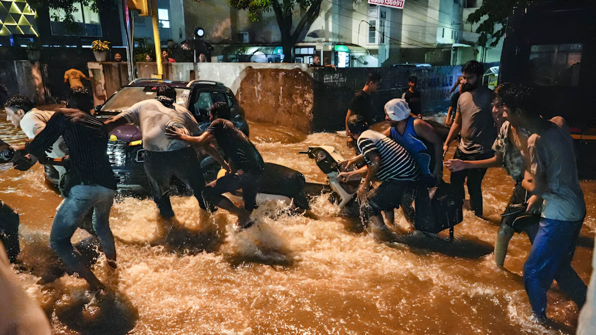 Delhi Grapples with Torrential Rains Flight Diversions and IMD Alert