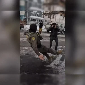 ICE Officer Slips on Ice