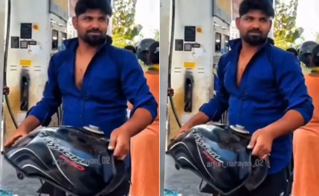 Man Filling Detached Bike Tank