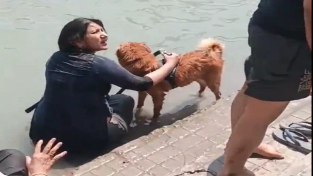 Video of Woman Bathing Pet Dog at Haridwar Ghat